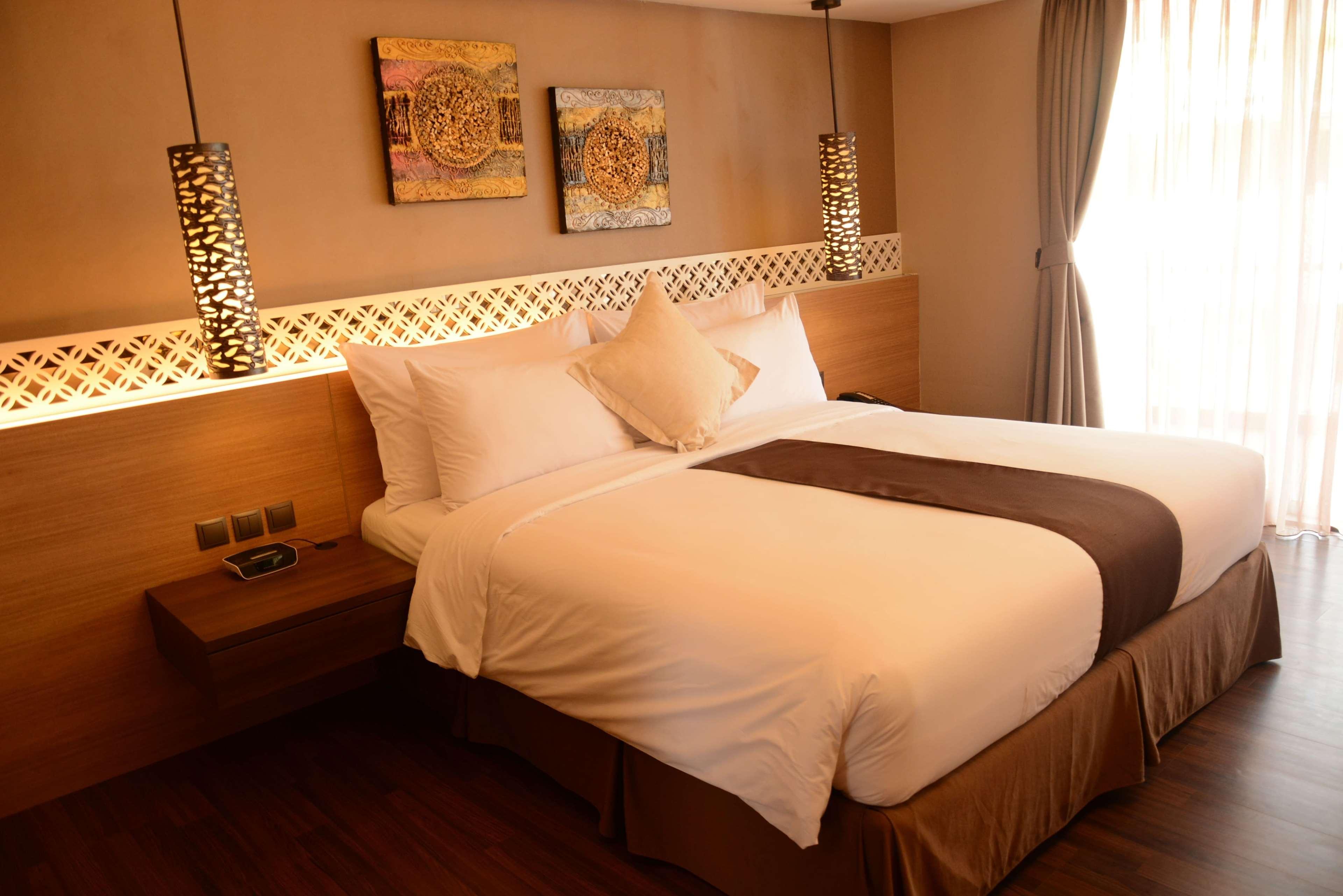 Отель Ramada By Wyndham Bali Sunset Road Kuta Семиньяк Экстерьер фото